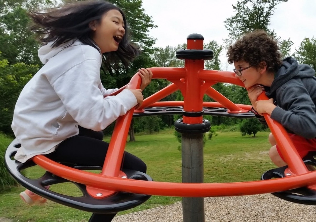 two campers on the playground